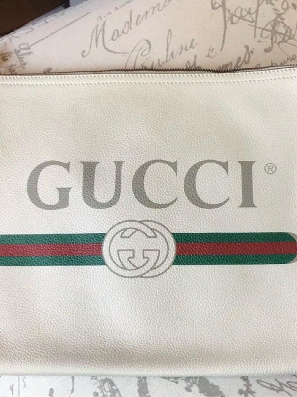 AUTHENTIC…Gucci Cream Leather Pouch with Green-Red Web Stripe